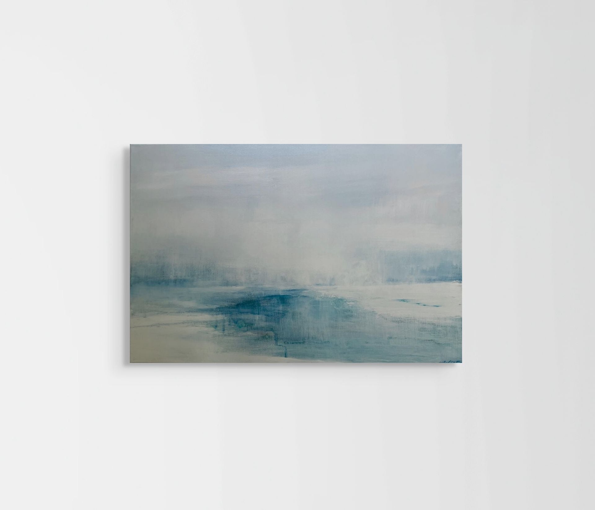 Abstract sea painting with blue and grey tones on a white background