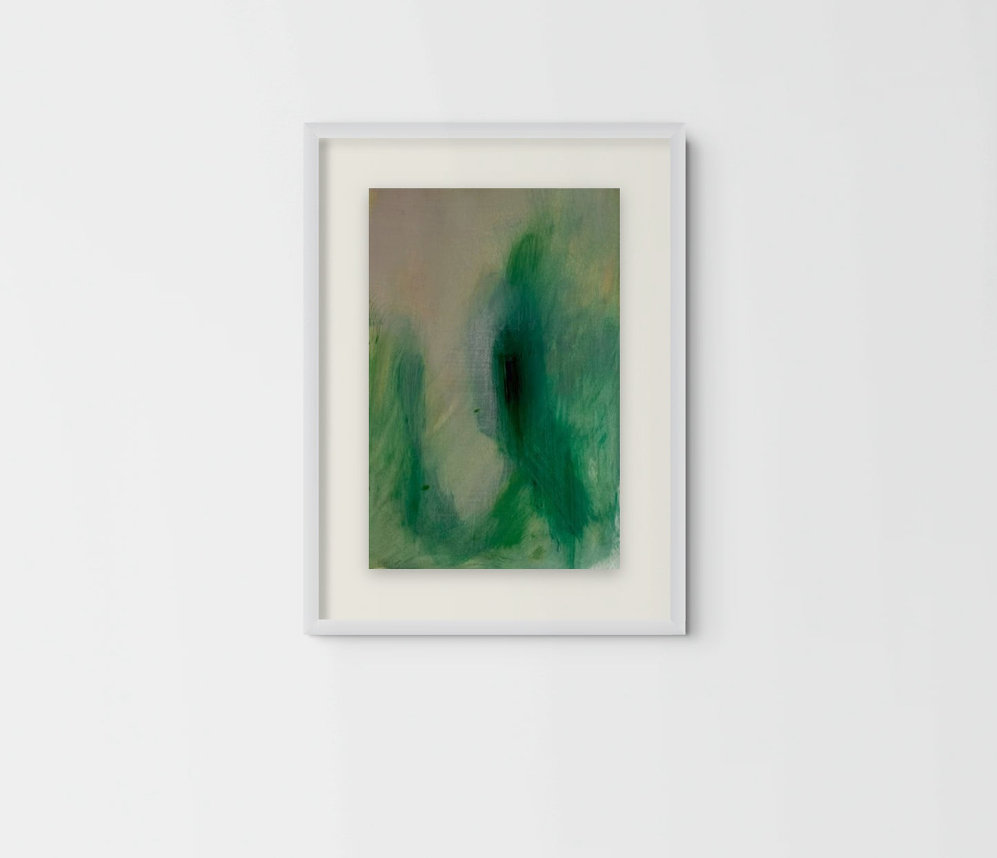 A framed abstract art print featuring green and teal watercolor-like shapes on a light beige background, housed in a white frame and mounted on a white wall.