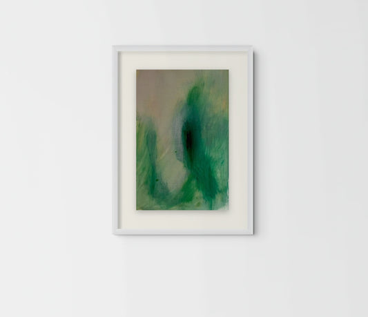 A framed abstract art print featuring green and teal watercolor-like shapes on a light beige background, housed in a white frame and mounted on a white wall.